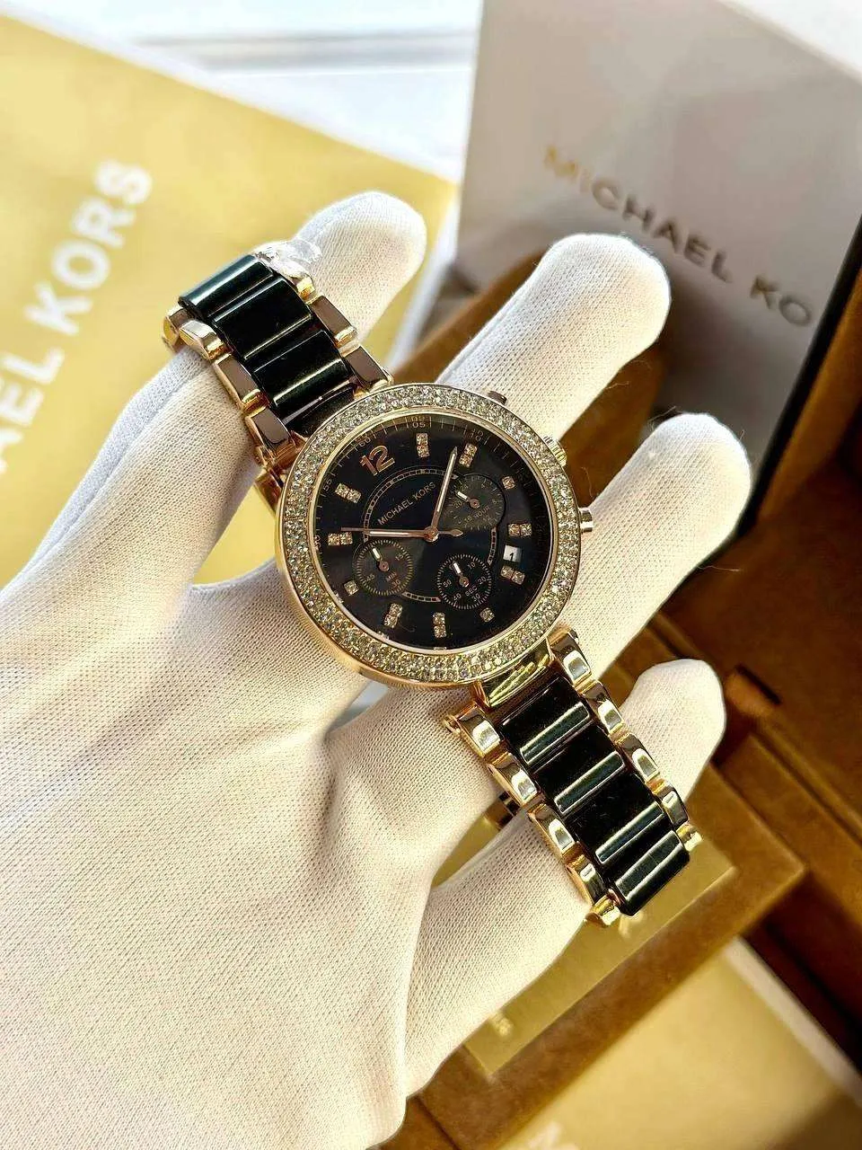 Michael Kors For Her Black  Perfectly made for outgoing and active ladies, this Michael Kors modern and stylish watch would be a great accessory for you.