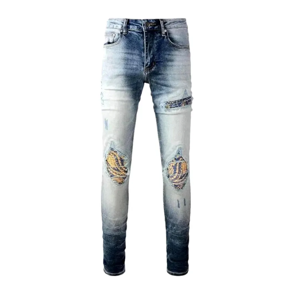 Whiskered mid rise skinny men's jeans